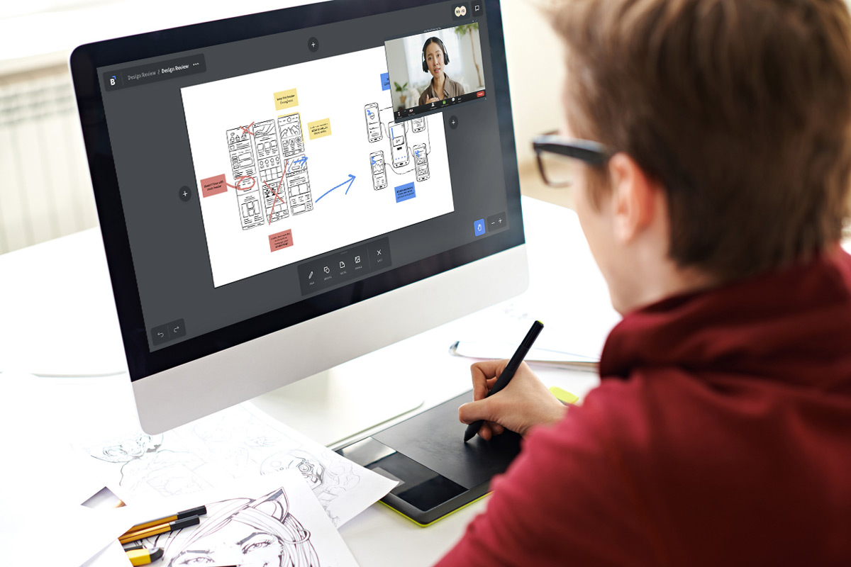 Person using a drawing tablet to create floor plans
